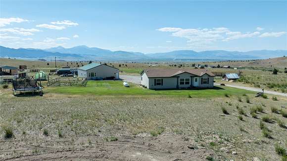 42.3 Acres of Recreational Land with Home for Sale in Ramsay, Montana