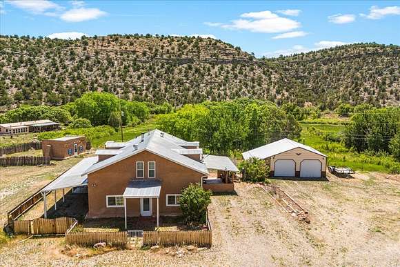 23.83 Acres of Agricultural Land with Home for Sale in La Madera, New Mexico