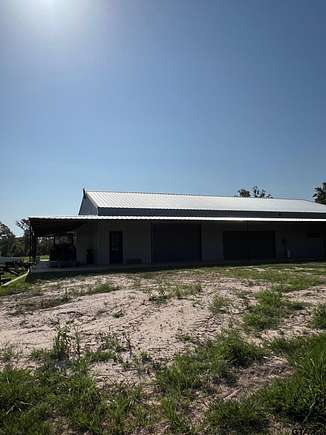93.23 Acres of Agricultural Land with Home for Sale in Troup, Texas