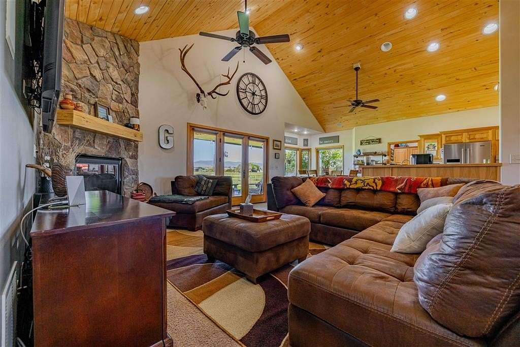 5 Acres of Residential Land with Home for Sale in Cody, Wyoming