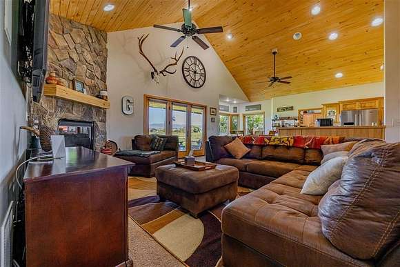 5 Acres of Residential Land with Home for Sale in Cody, Wyoming