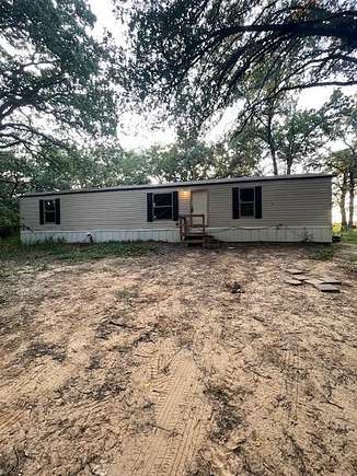 2.616 Acres of Residential Land with Home for Sale in Combine, Texas