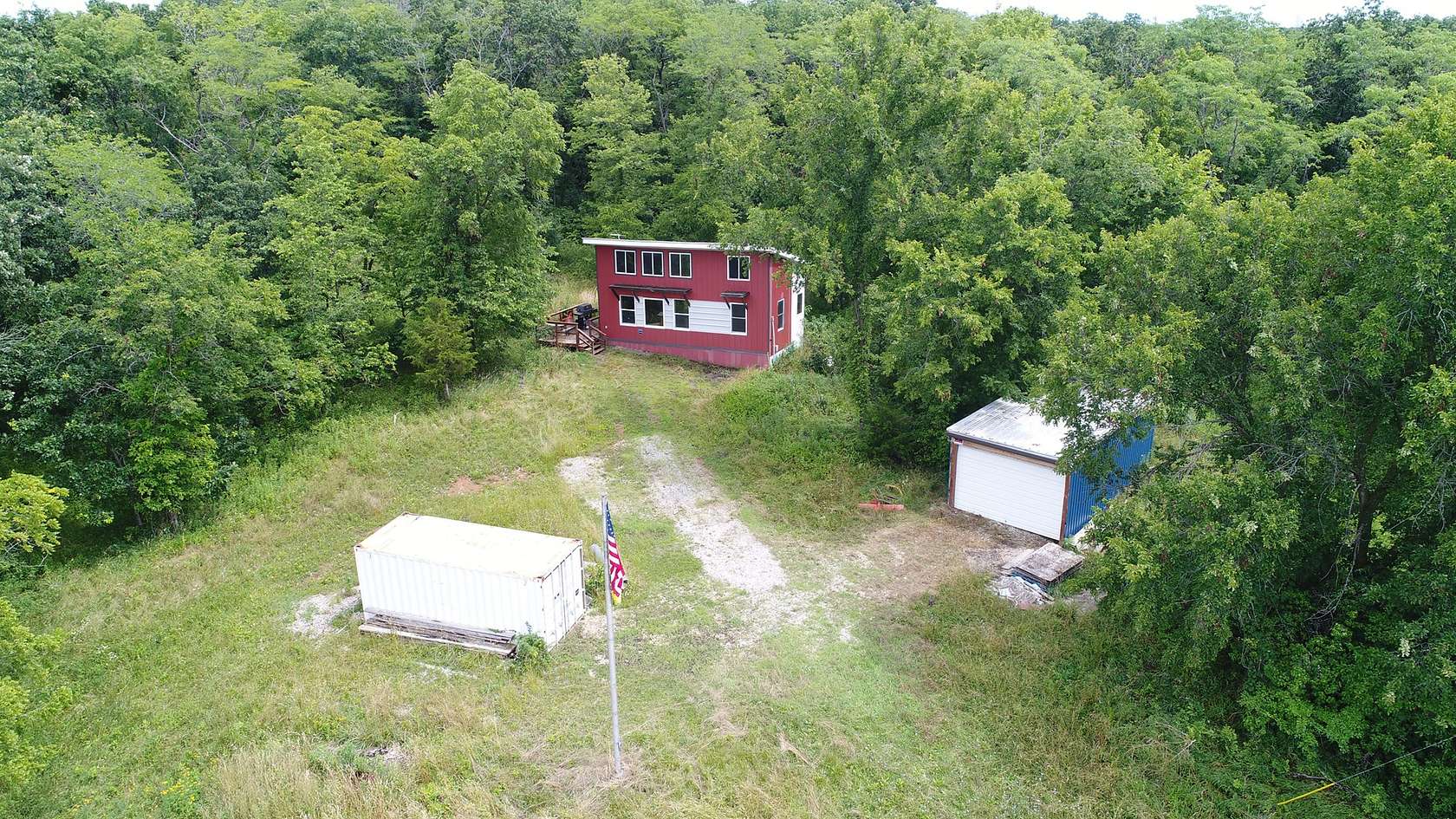 107 Acres of Land with Home for Sale in Green Castle, Missouri