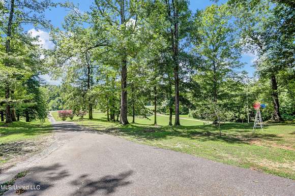 5 Acres of Residential Land with Home for Sale in Walls, Mississippi