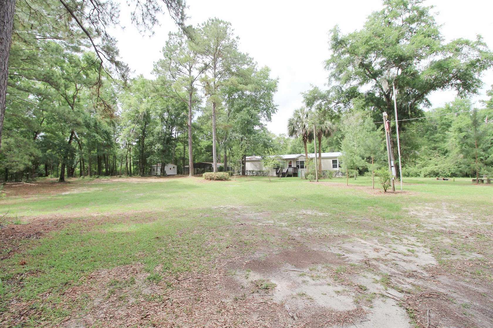 2.54 Acres of Residential Land with Home for Sale in Crawfordville, Florida