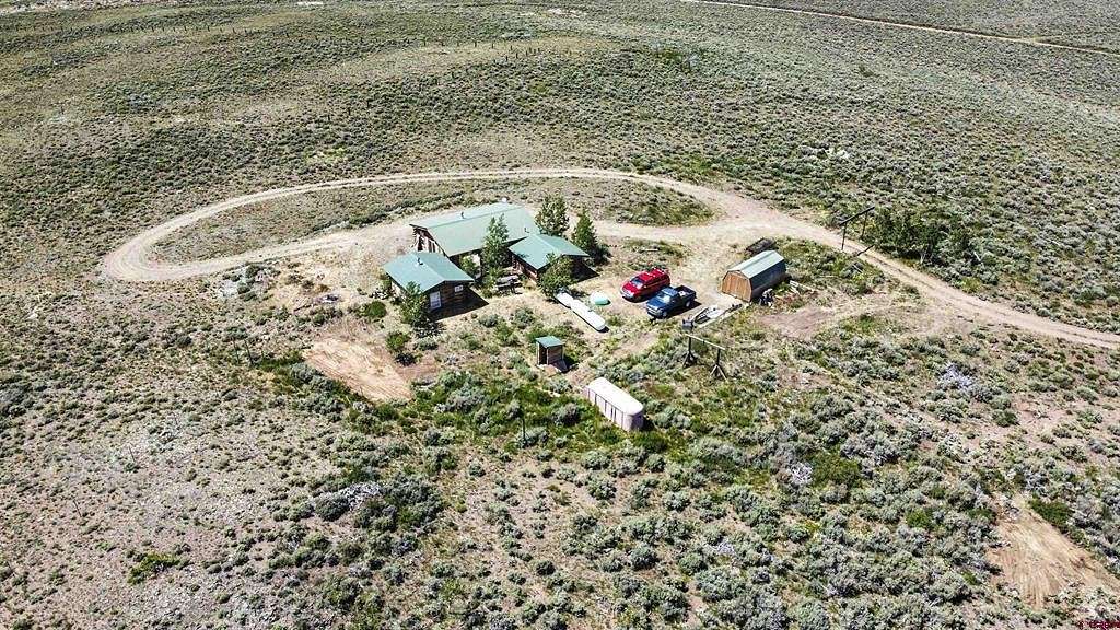 13 Acres of Recreational Land with Home for Sale in Gunnison, Colorado
