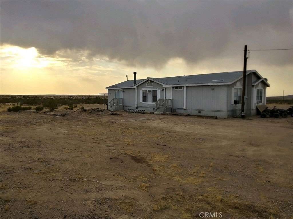 4.7 Acres of Residential Land with Home for Sale in Helendale, California