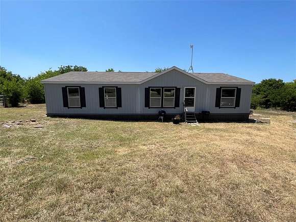 2.68 Acres of Residential Land with Home for Sale in New Fairview, Texas