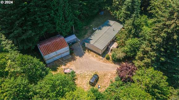 4.39 Acres of Residential Land with Home for Sale in Reedsport, Oregon