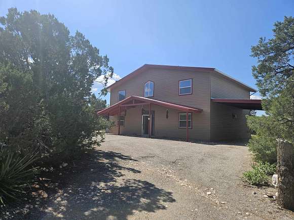 2.5 Acres of Residential Land with Home for Sale in La Luz, New Mexico