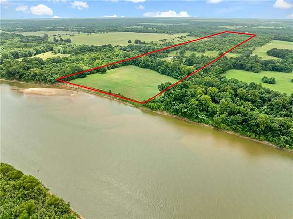 79.47 Acres of Land with Home for Sale in Arthur City, Texas