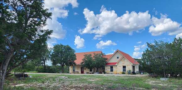 14.2 Acres of Land with Home for Sale in Center Point, Texas