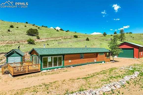 4.78 Acres of Residential Land with Home for Sale in Cripple Creek, Colorado
