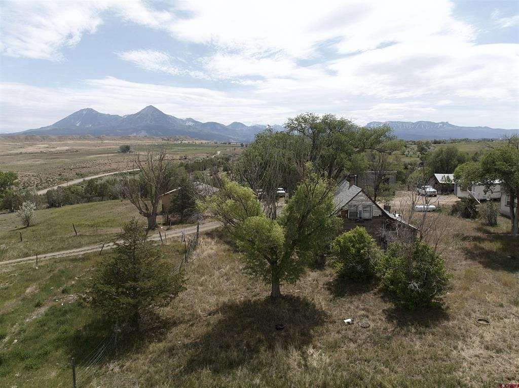200 Acres of Agricultural Land with Home for Sale in Crawford, Colorado