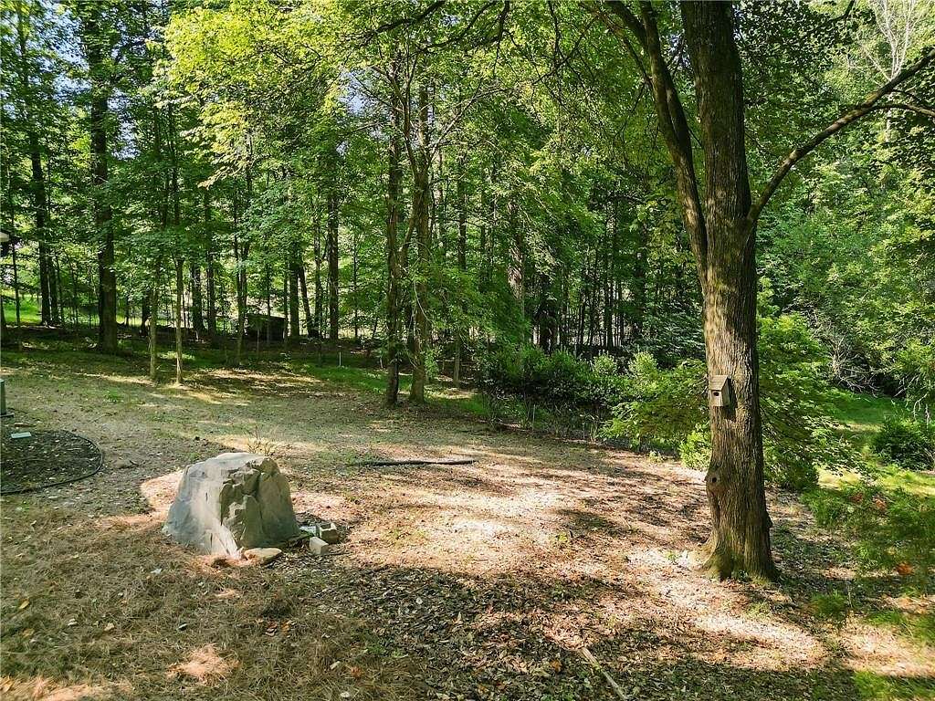 1.099 Acres of Residential Land with Home for Sale in Milton, Georgia