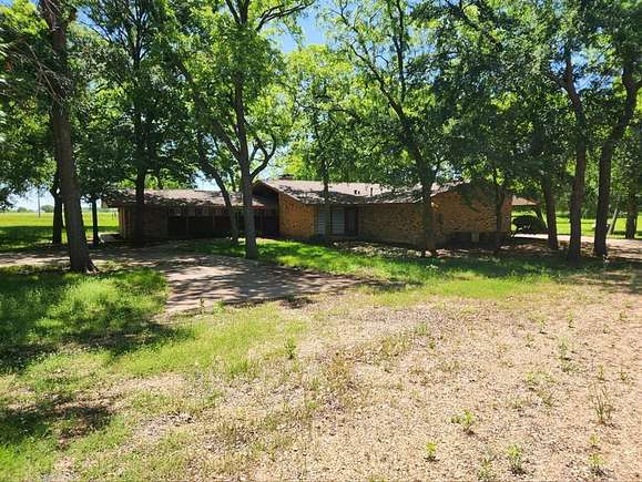 7 Acres of Residential Land with Home for Sale in Sherman, Texas