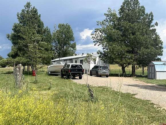 4.7 Acres of Residential Land with Home for Sale in Ignacio, Colorado