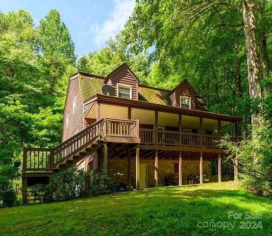 14.5 Acres of Land with Home for Sale in Balsam Grove, North Carolina