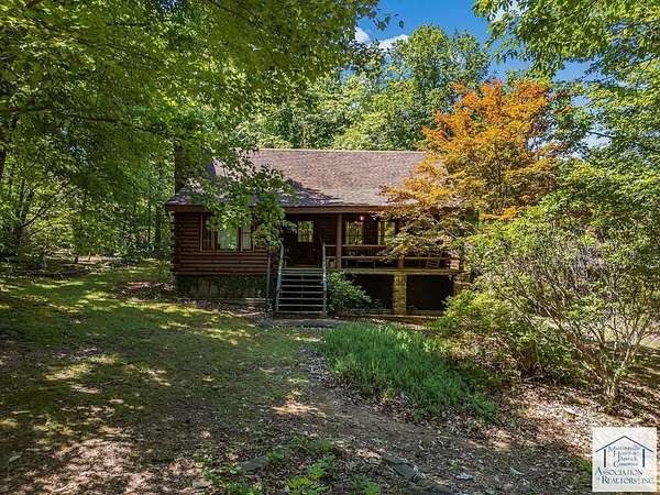 5 Acres of Residential Land with Home for Sale in Patrick Springs, Virginia