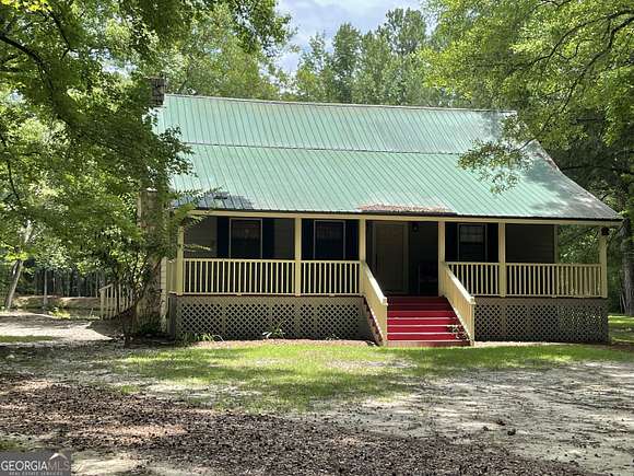 10.44 Acres of Land with Home for Sale in Metter, Georgia