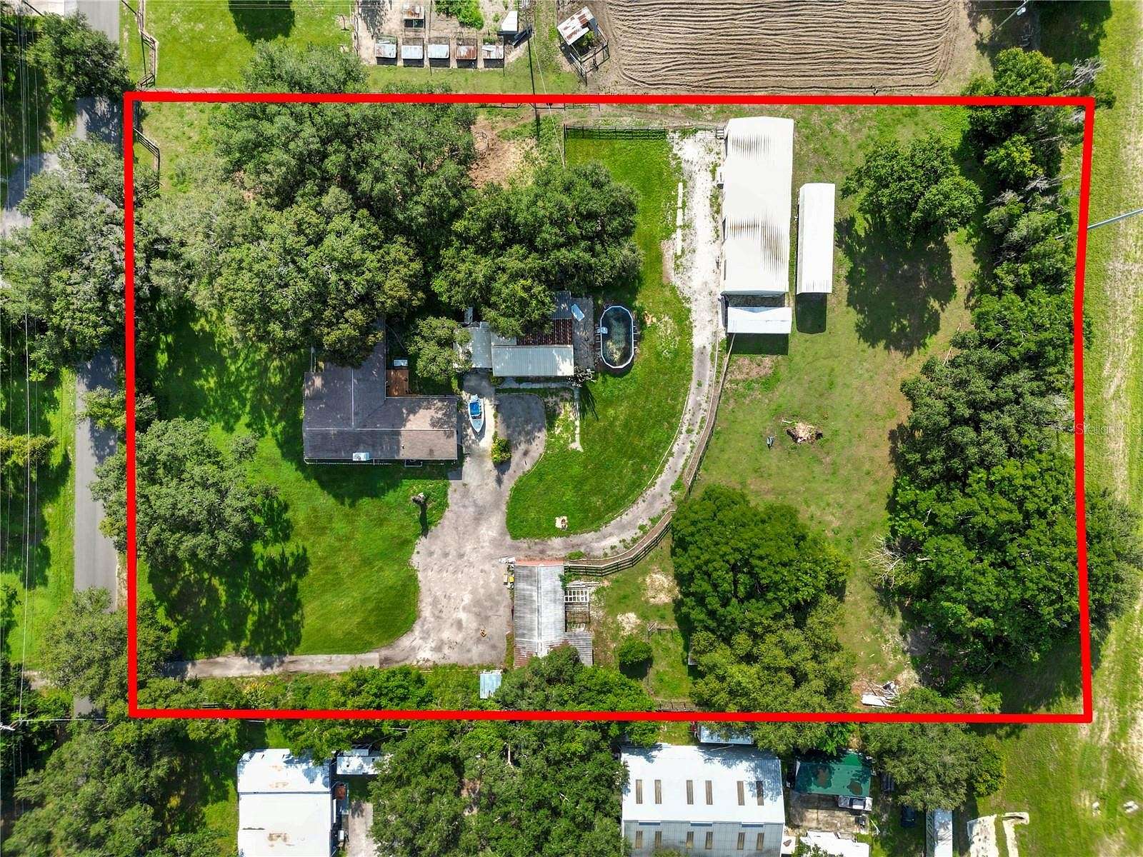 3.14 Acres of Residential Land with Home for Sale in Plant City, Florida