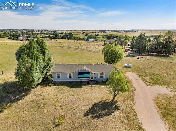5.02 Acres of Residential Land with Home for Sale in Peyton, Colorado