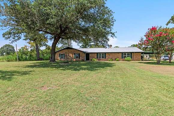 12.88 Acres of Land with Home for Sale in Athens, Texas