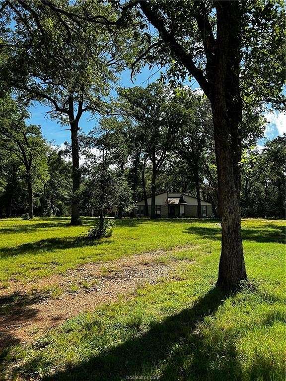 2.421 Acres of Residential Land with Home for Sale in Hearne, Texas