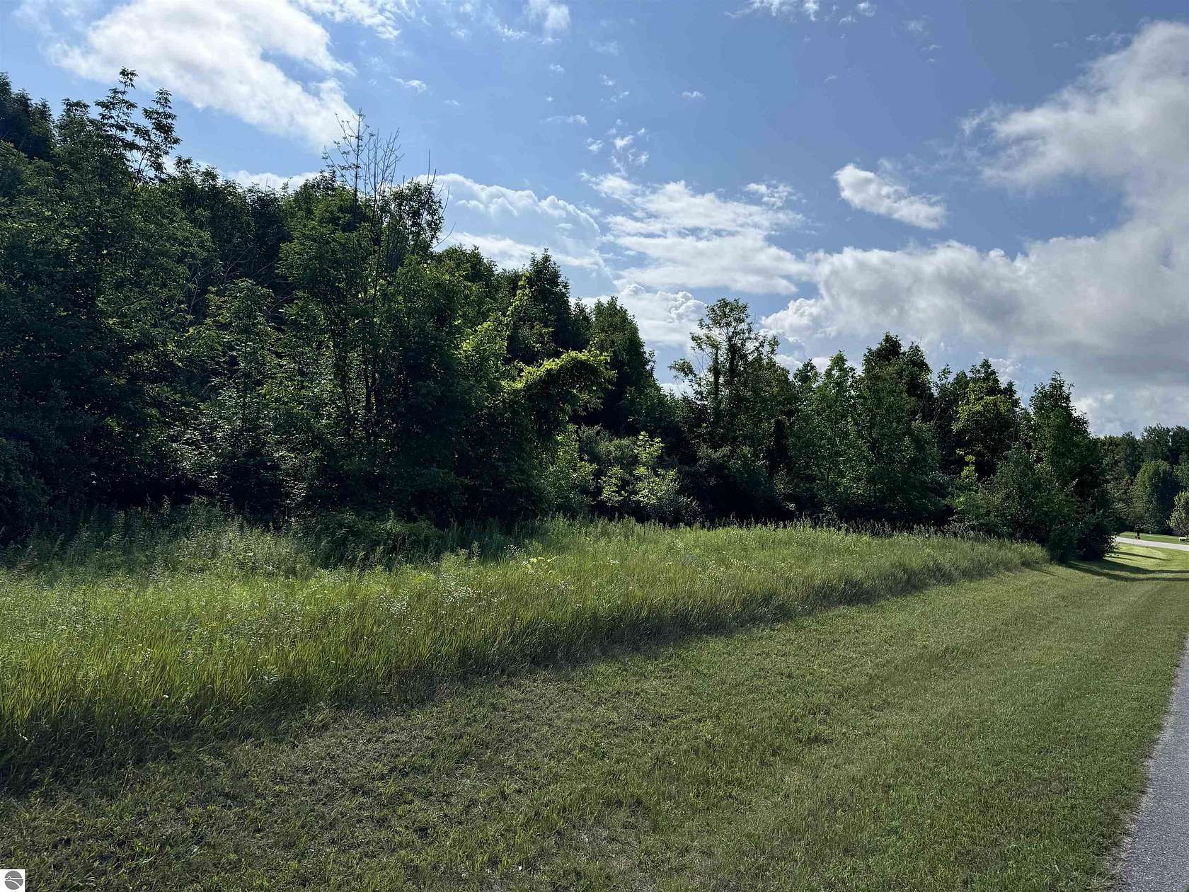 7.5 Acres of Land for Sale in Kewadin, Michigan