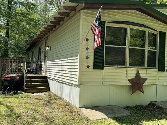 2.5 Acres of Residential Land with Home for Sale in White Lake, Wisconsin