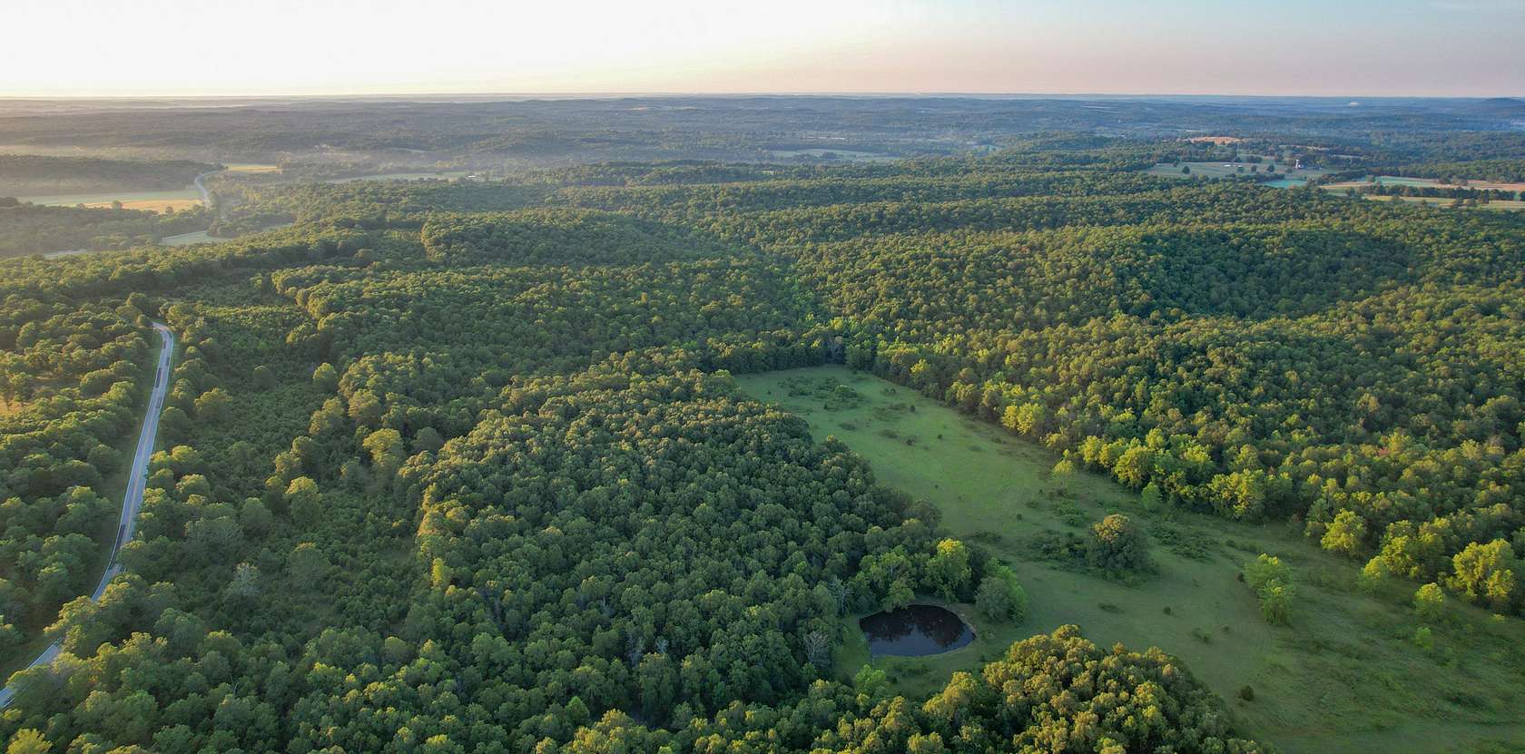 1,134 Acres of Recreational Land & Farm for Auction in West Plains, Missouri