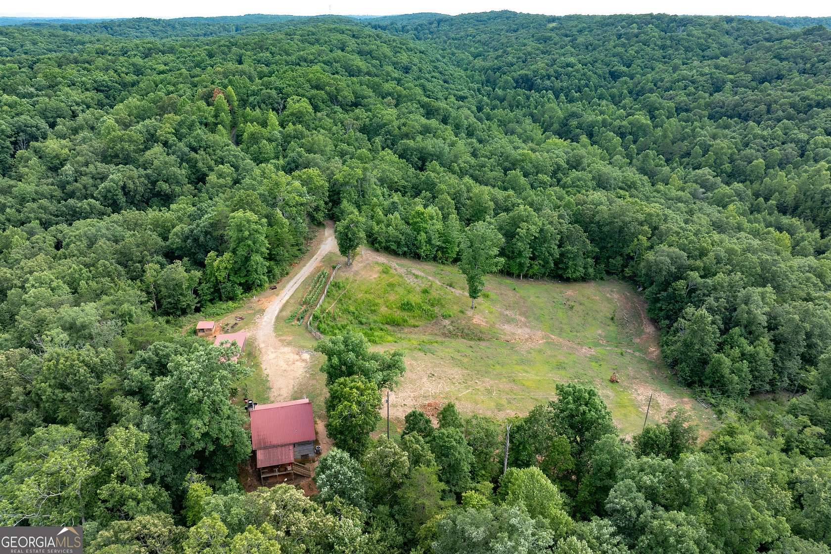 25.09 Acres of Land with Home for Sale in Dahlonega, Georgia