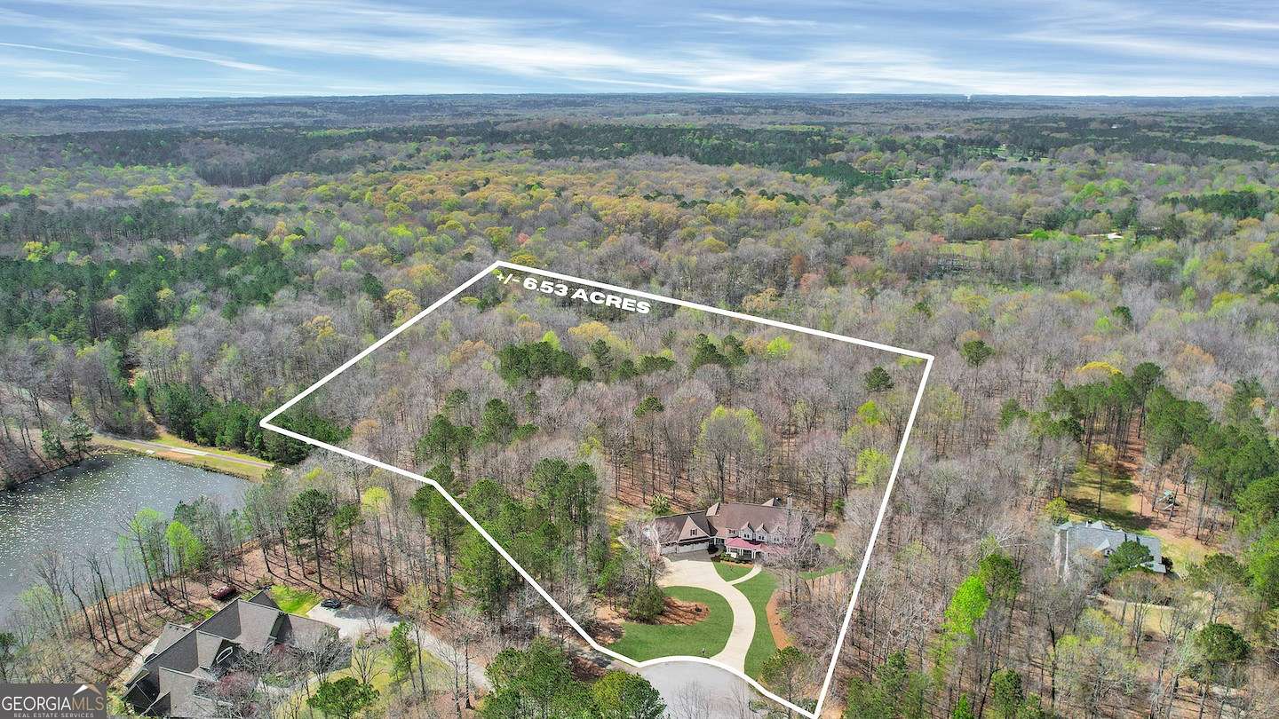 6.53 Acres of Residential Land with Home for Sale in Brooks, Georgia