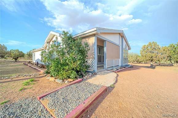 10.7 Acres of Land with Home for Sale in Kingman, Arizona