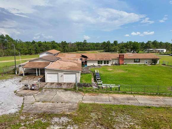 5.25 Acres of Residential Land with Home for Sale in Freeport, Florida