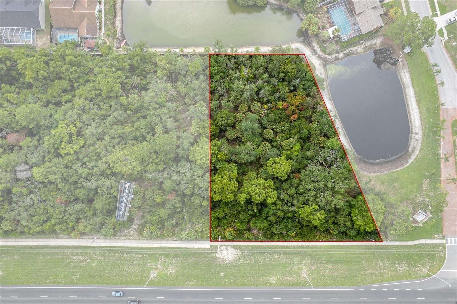 0.98 Acres of Commercial Land for Sale in Hudson, Florida