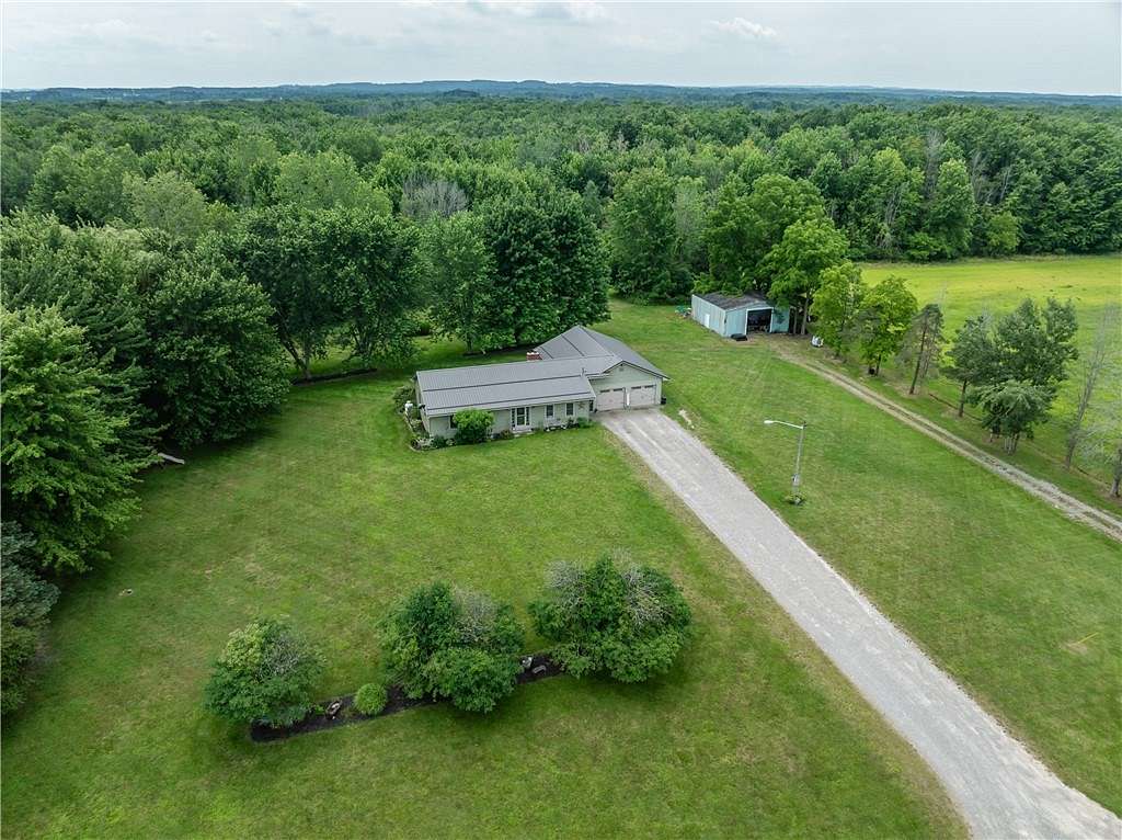 29.2 Acres of Recreational Land with Home for Sale in Stafford, New York