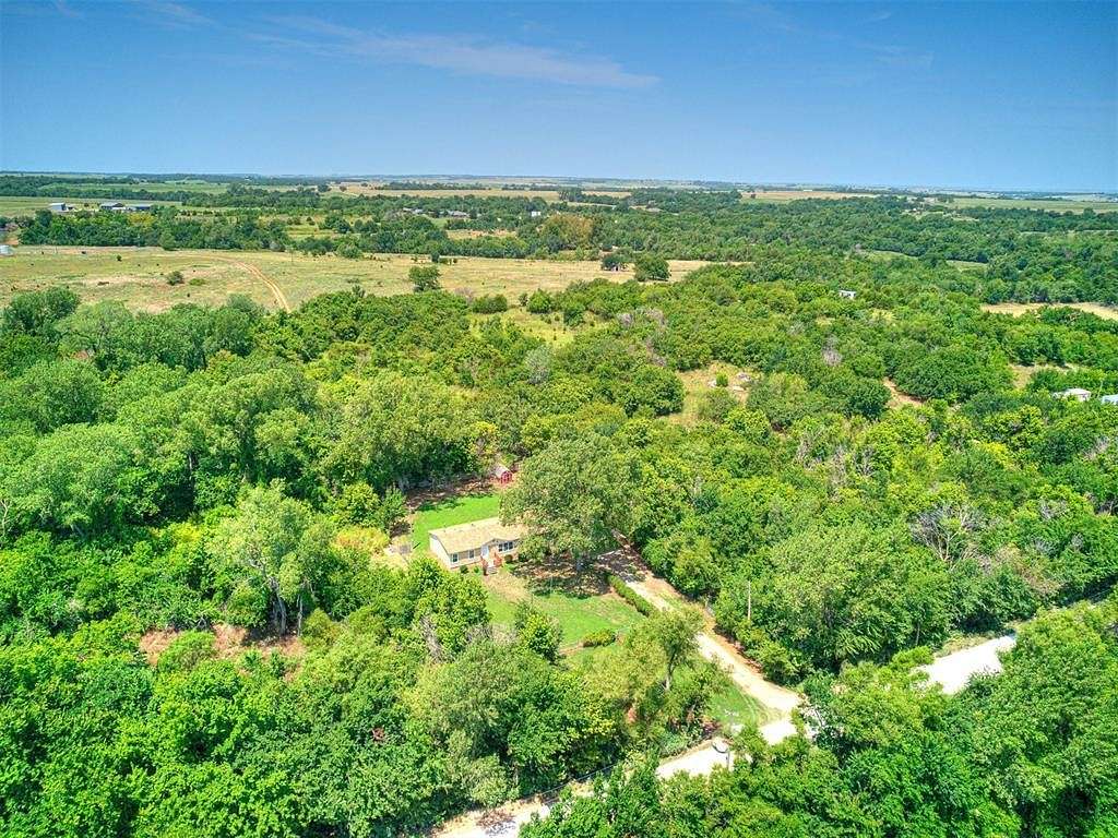 5.1 Acres of Residential Land with Home for Sale in Chickasha, Oklahoma