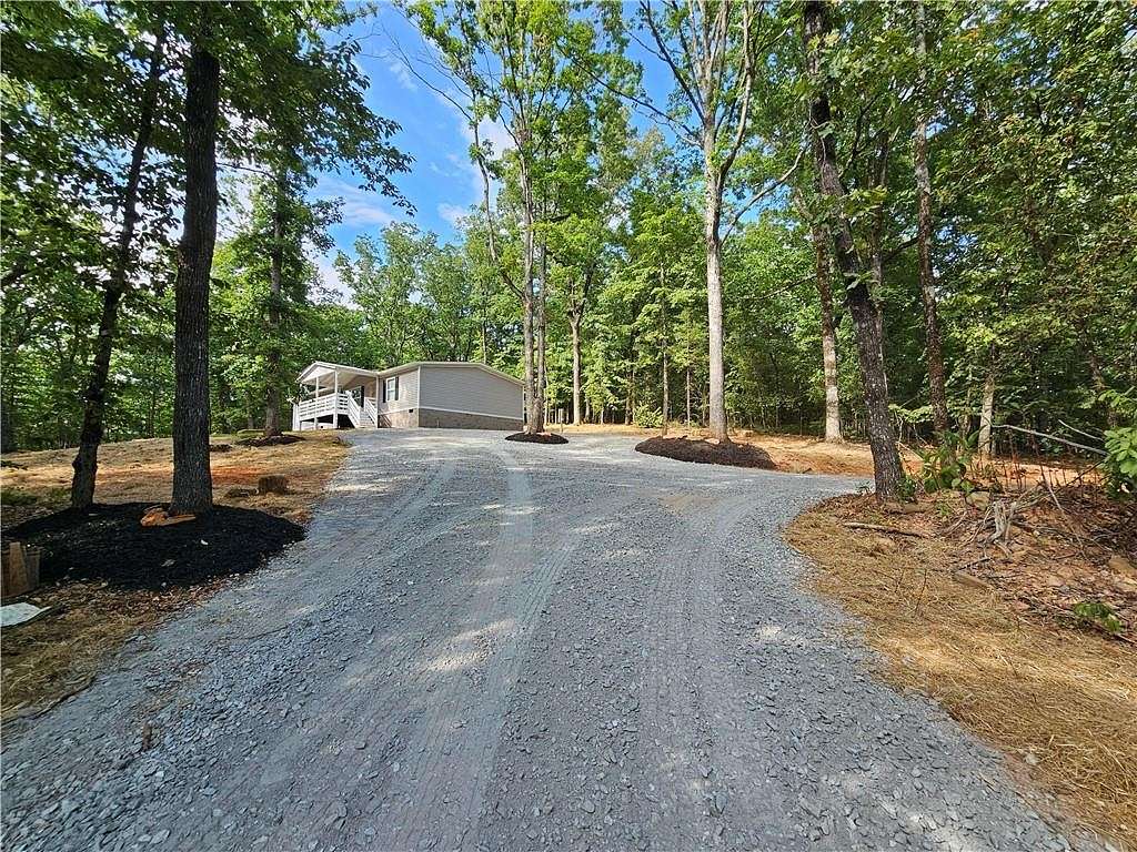3.163 Acres of Residential Land with Home for Sale in Dahlonega, Georgia