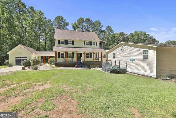 6.6 Acres of Land with Home for Sale in Newnan, Georgia