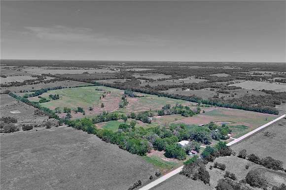 80 Acres of Agricultural Land with Home for Sale in Fort Scott, Kansas
