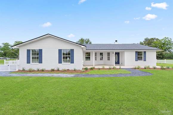 13.4 Acres of Land with Home for Sale in Milton, Florida