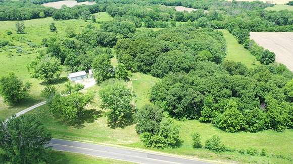 20 Acres of Agricultural Land with Home for Sale in Hamilton, Missouri
