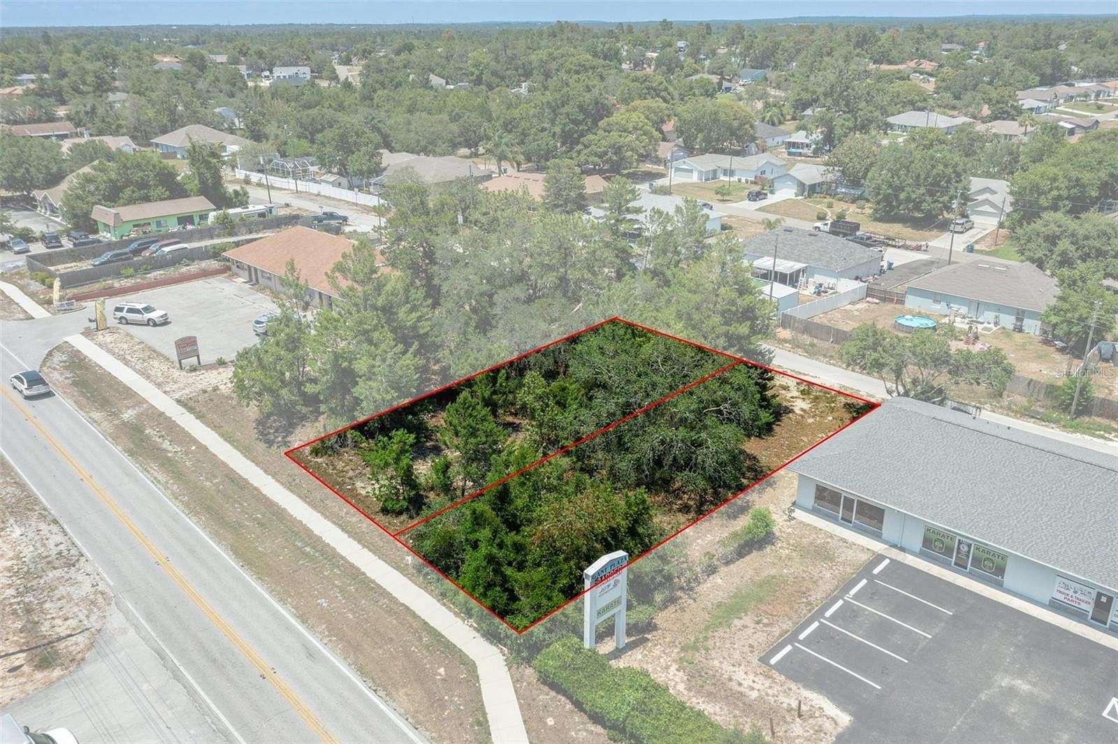 0.17 Acres of Commercial Land for Sale in Spring Hill, Florida