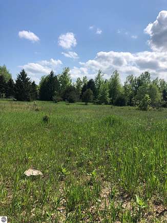 0.69 Acres of Land for Sale in Cedar, Michigan