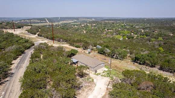 11.8 Acres of Land with Home for Sale in Ingram, Texas