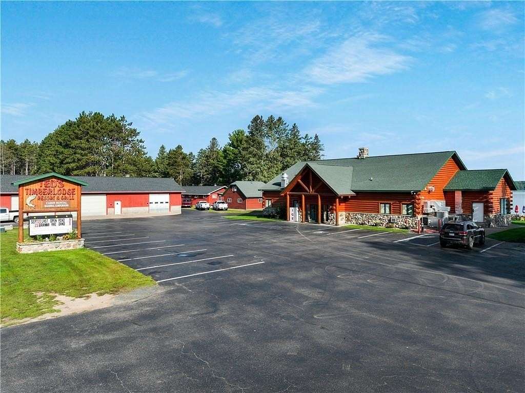 11.7 Acres of Improved Mixed-Use Land for Sale in Holcombe, Wisconsin