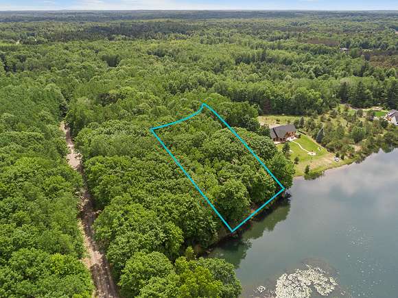1.2 Acres of Residential Land for Sale in Canadian Lakes, Michigan