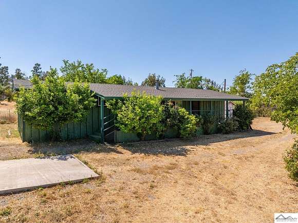2 Acres of Residential Land with Home for Sale in Corning, California