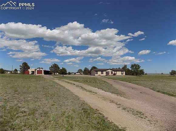 5.1 Acres of Residential Land with Home for Sale in Peyton, Colorado